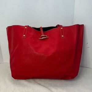 CHARLES FORD “ Red bottoms Red” leather tote bag.
